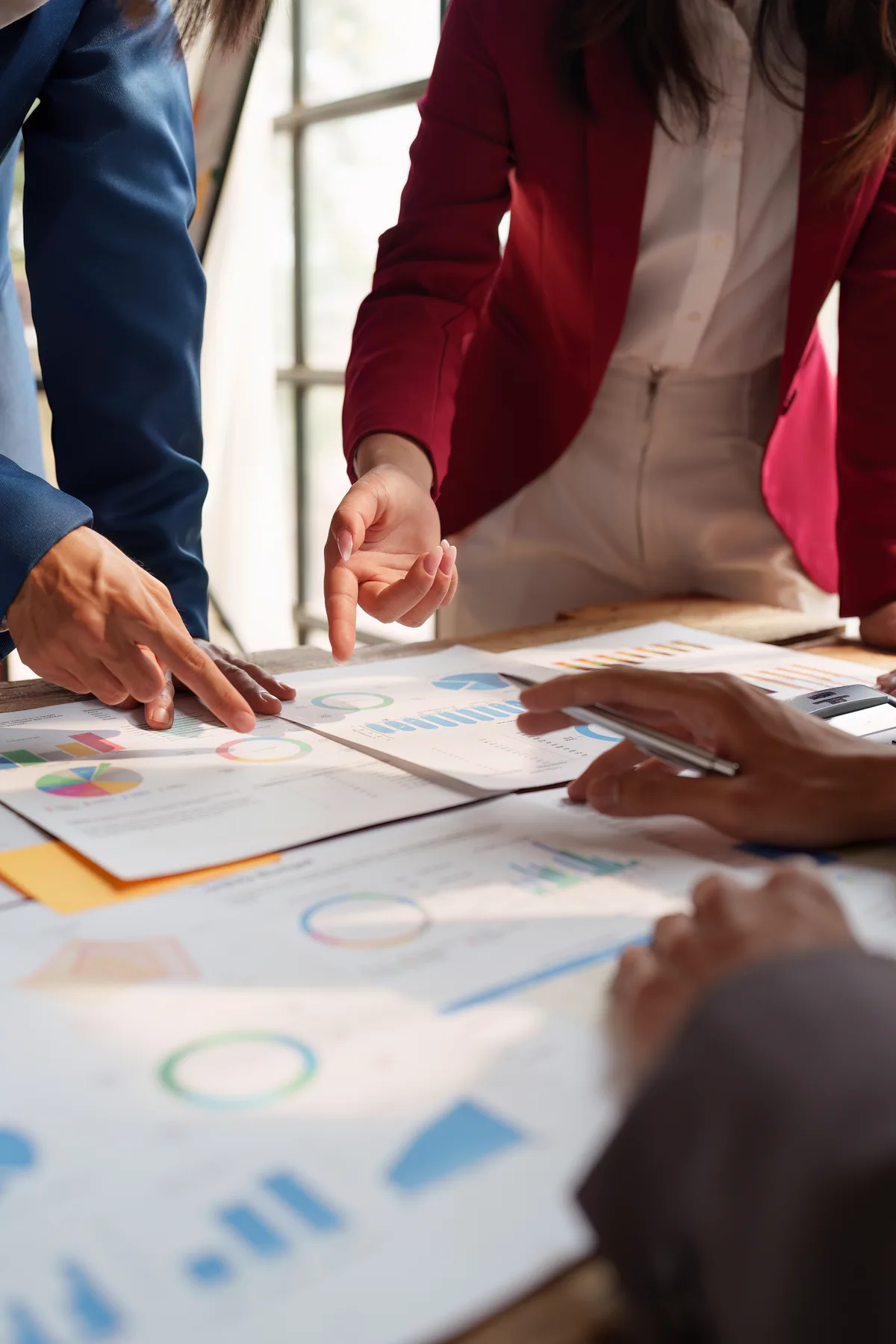 Accountants reviewing financial statements together