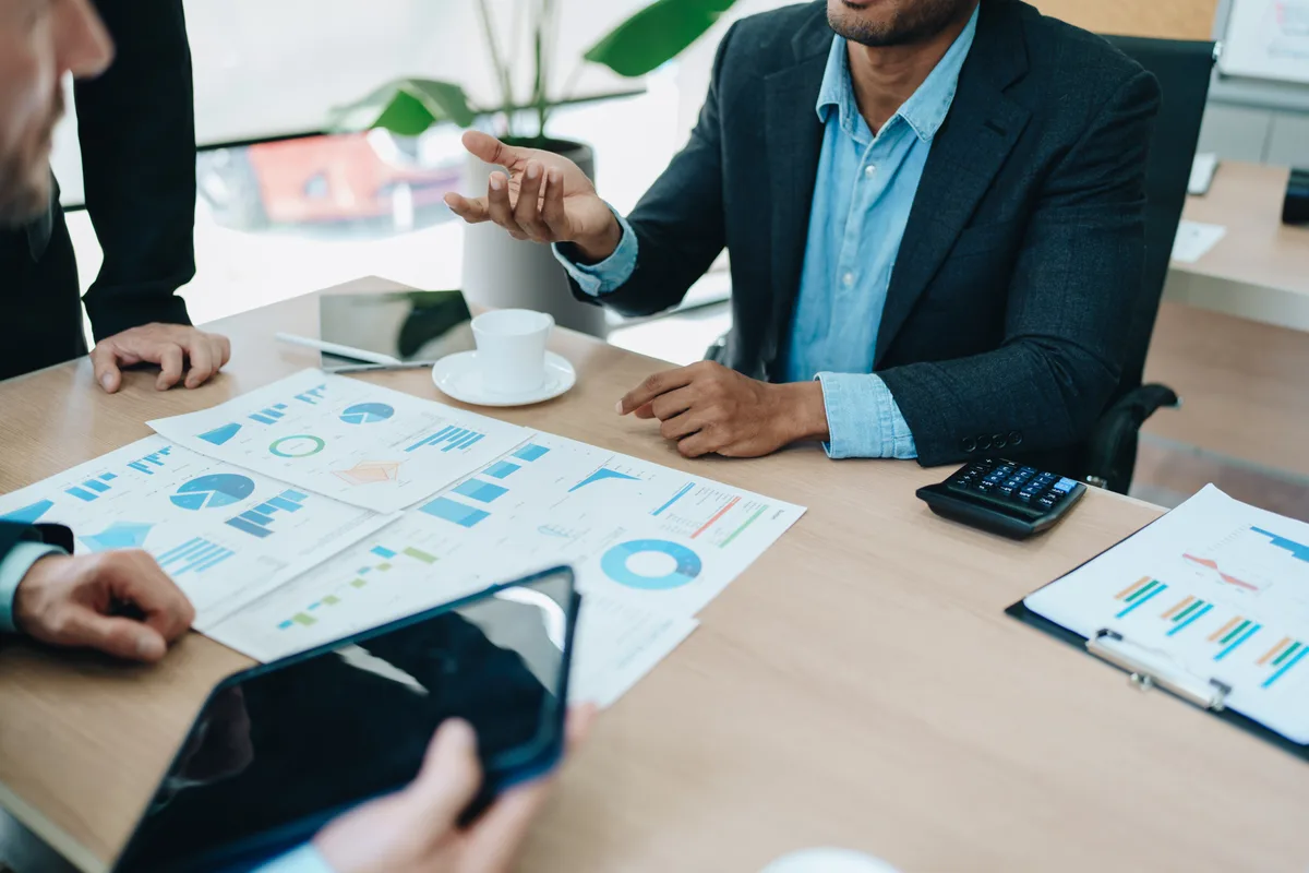 AnalytIQ advisors working with a client
