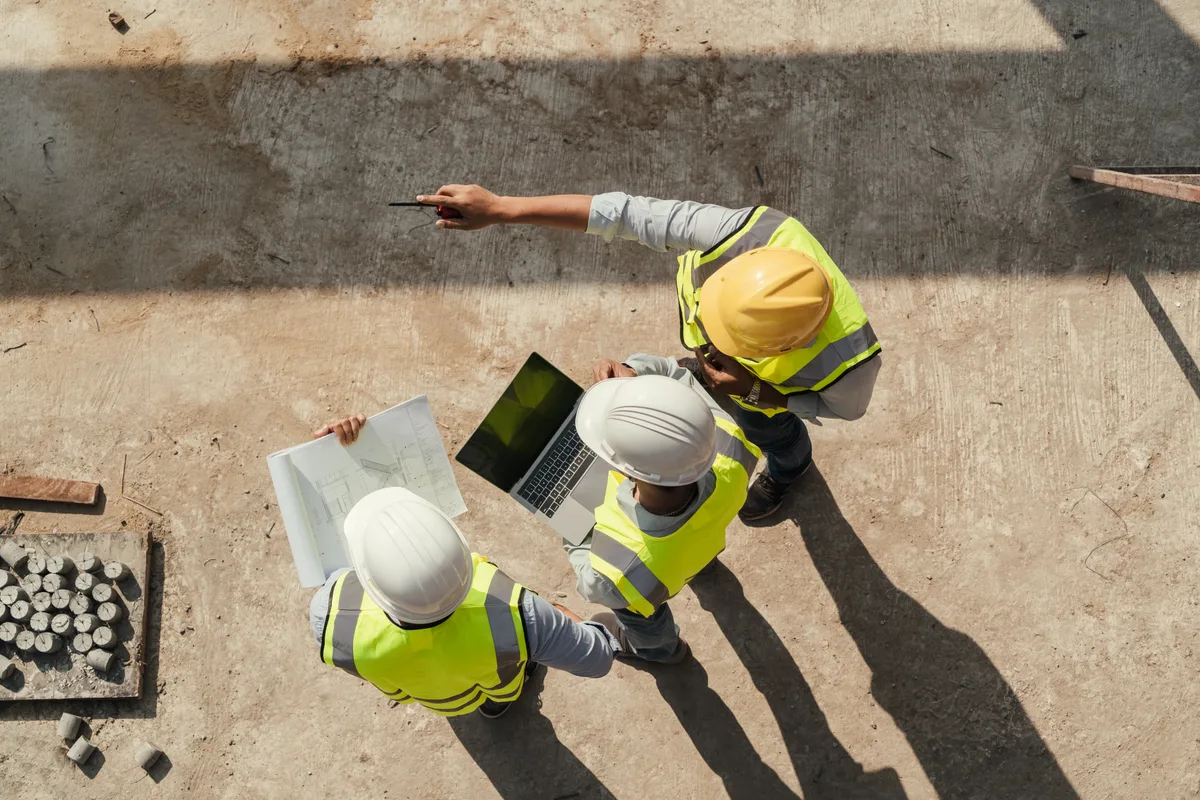 Contractor inspecting progress on a construction site