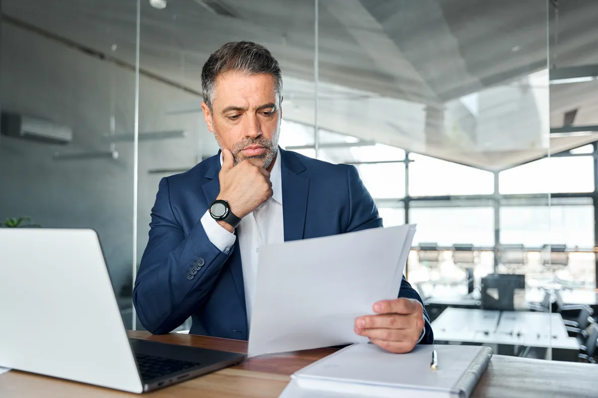 Accountant reviewing corporate tax documents