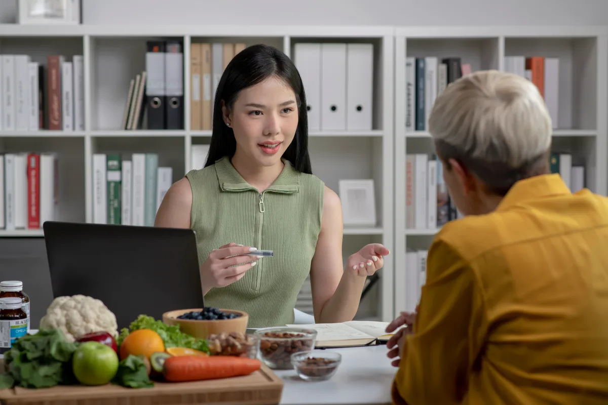 Registered dietitian reviewing a nutrition plan with a client
