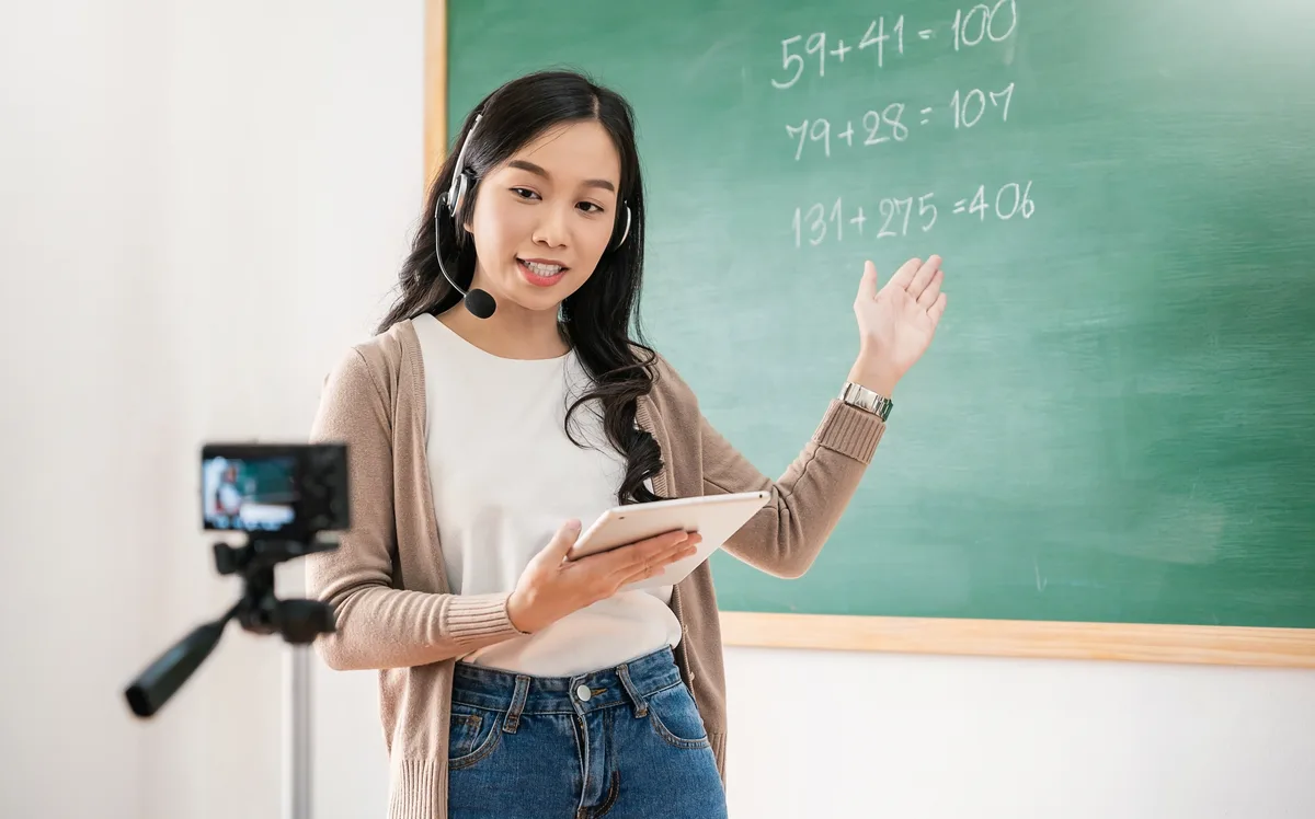 Course creator recording a video lesson for an online program