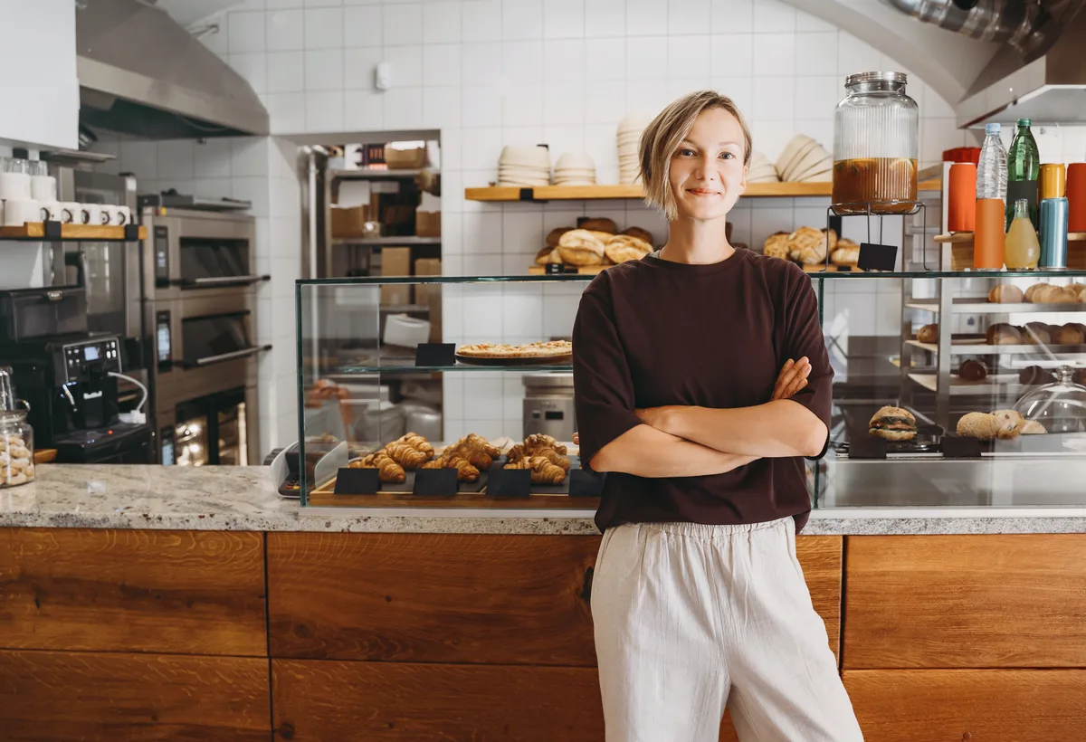 Franchise owner at the counter of her bakery location