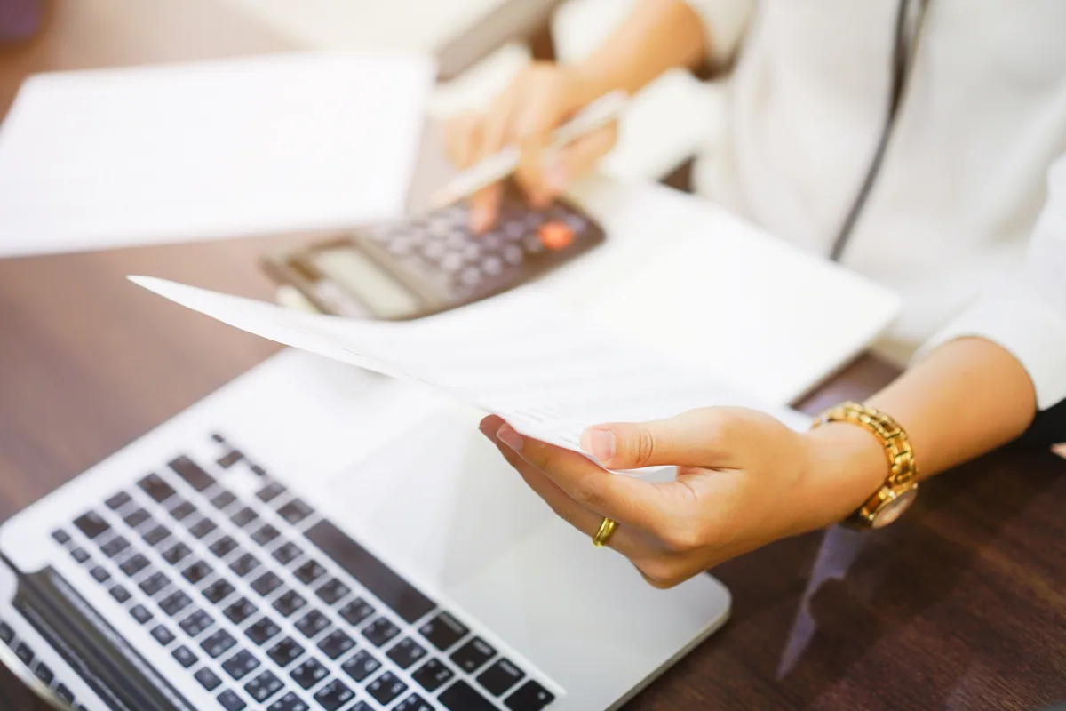 Processing payroll statements with a calculator