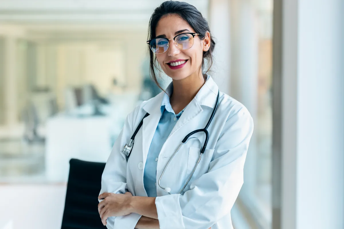 Physician consulting with a patient in a clinic office