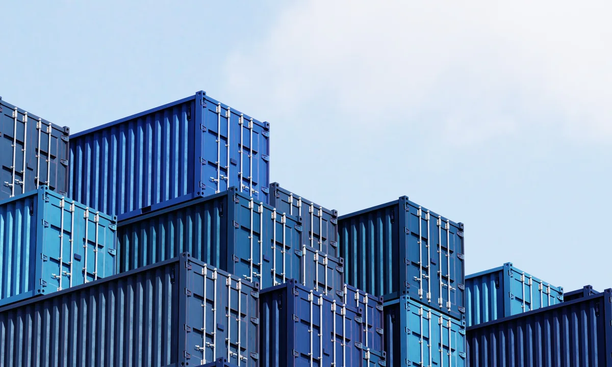 Shipping containers stacked at a port terminal