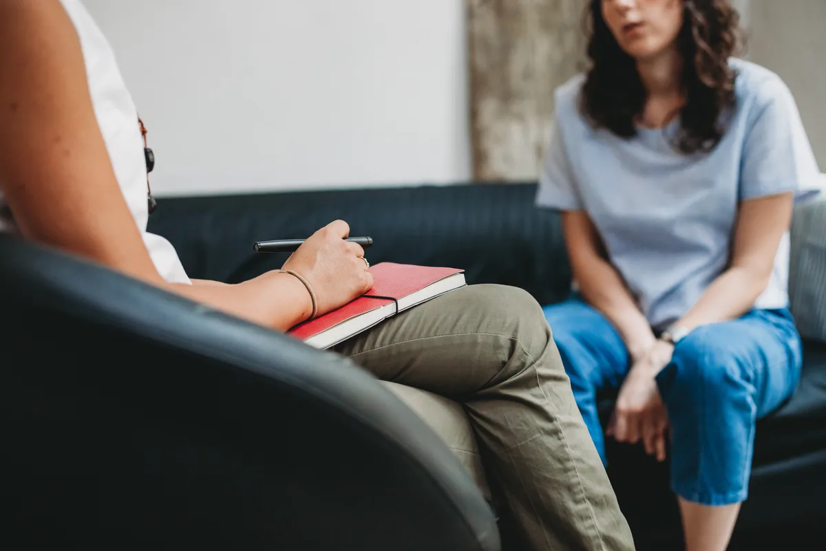 Therapist in session with a client in a private practice office